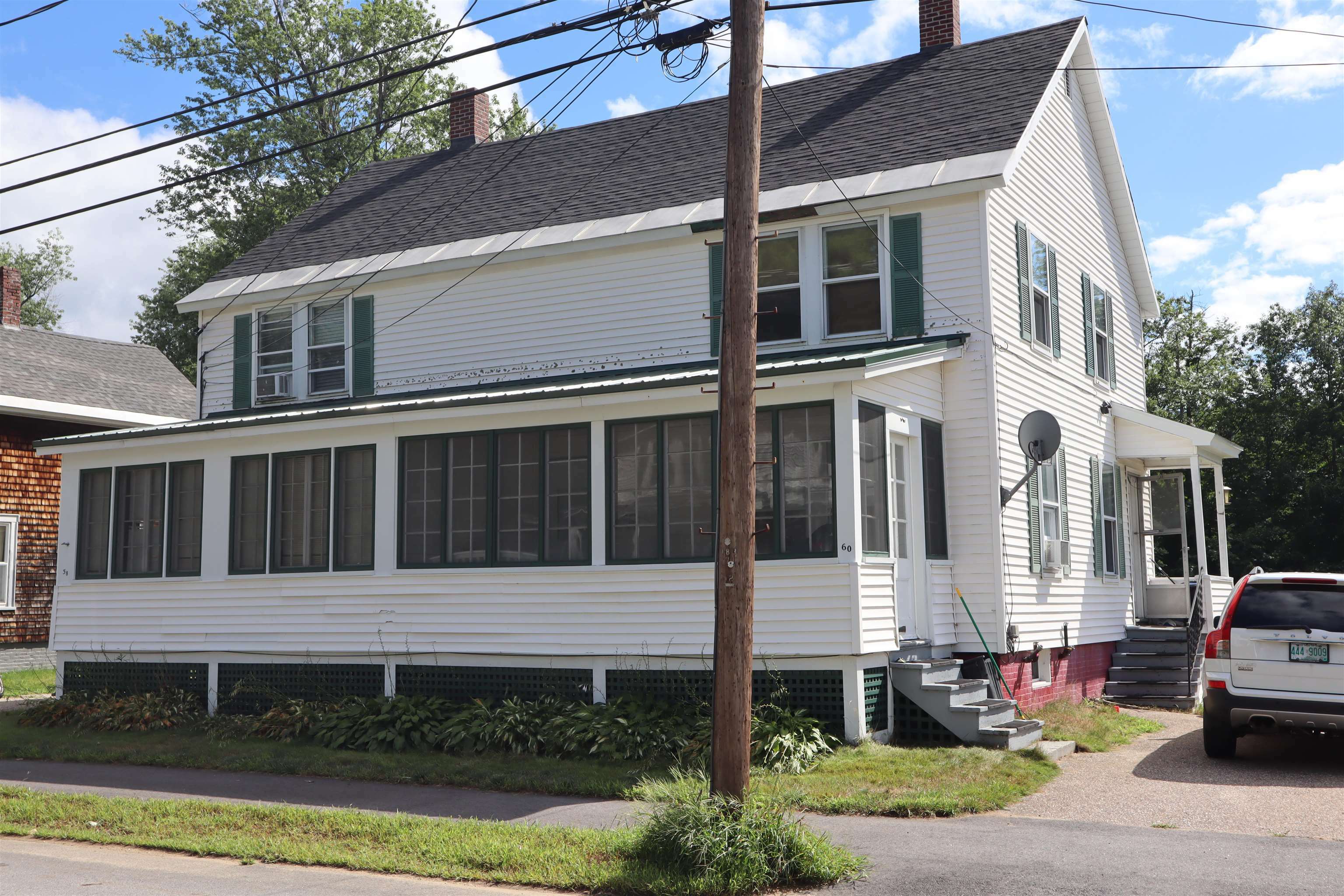 Property Photo:  58-60 Grant Street  NH 03246 