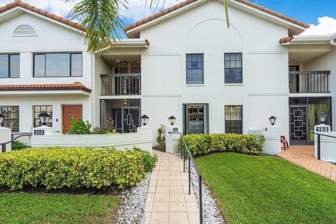 Property Photo:  9704 Sills Drive E 102  FL 33437 