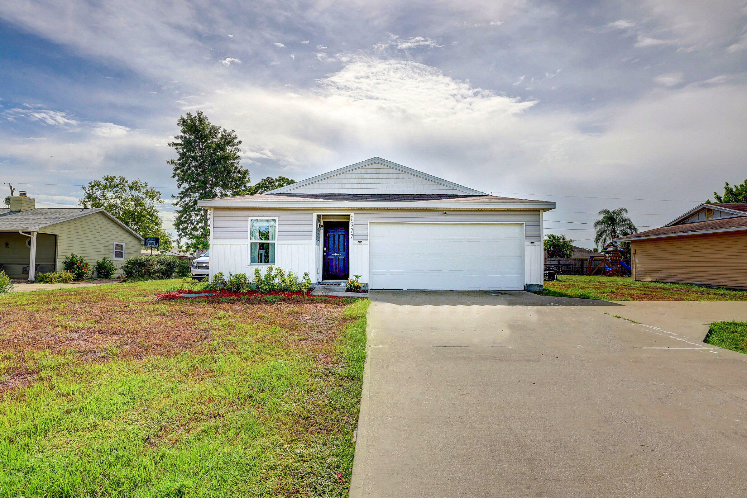 Property Photo:  1977 SE Floresta Drive  FL 34983 