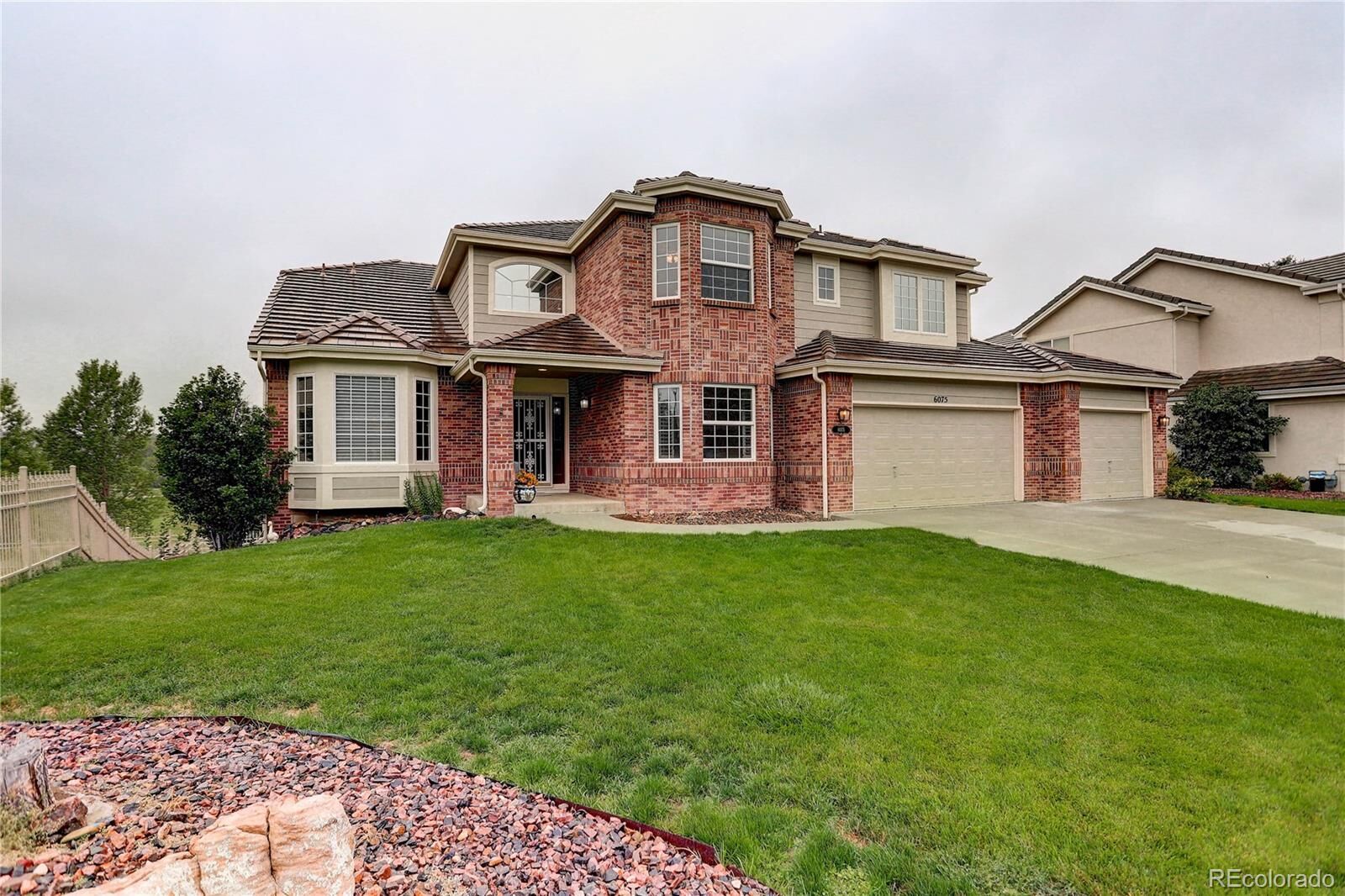 Property Photo: 6075 S Biscay Street CO 80016