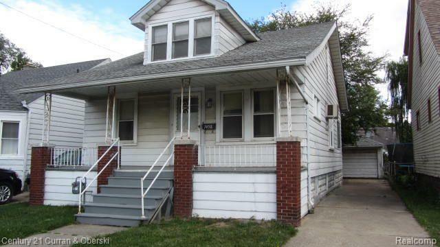 Property Photo:  7458 Coleman Street E  MI 48126 