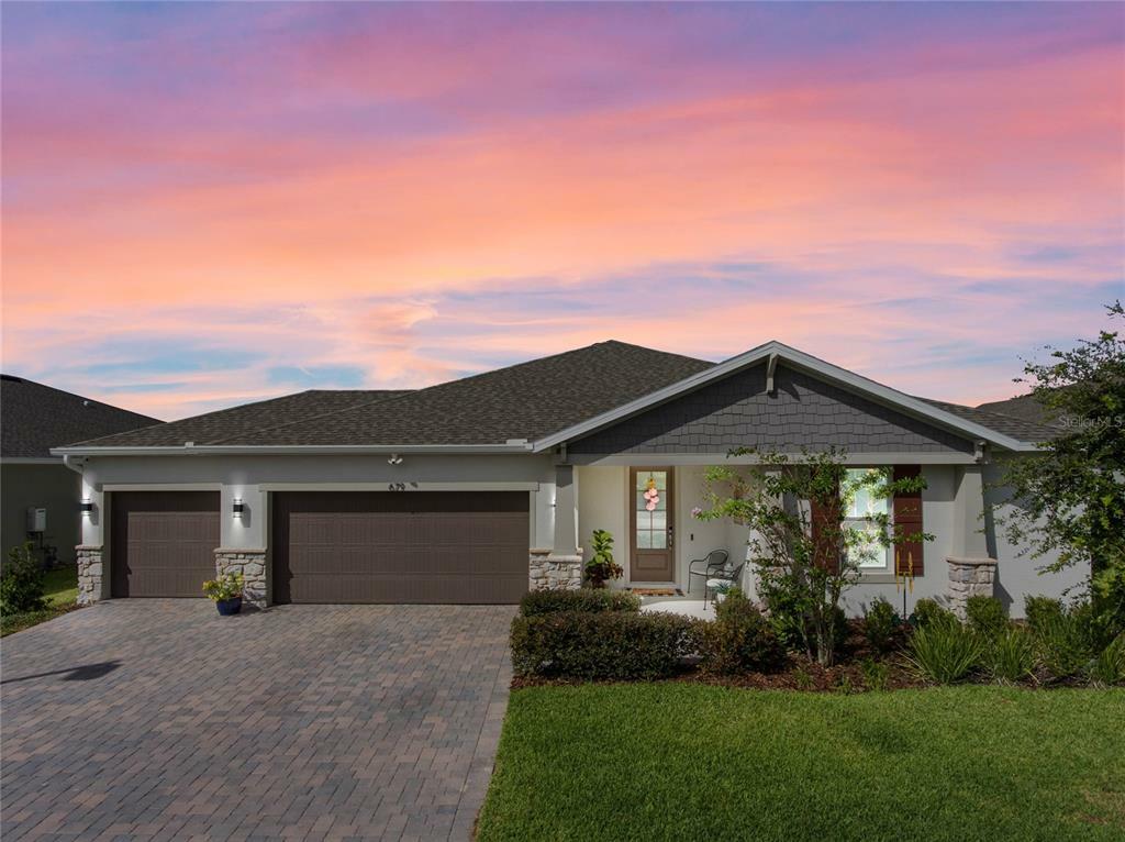 Property Photo:  679 Blue Citrus Lane  FL 34715 