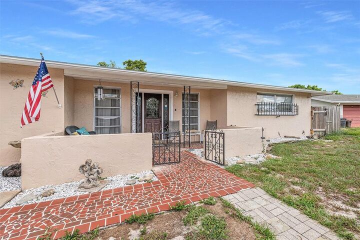 Property Photo:  7611 Lotus Drive  FL 34668 