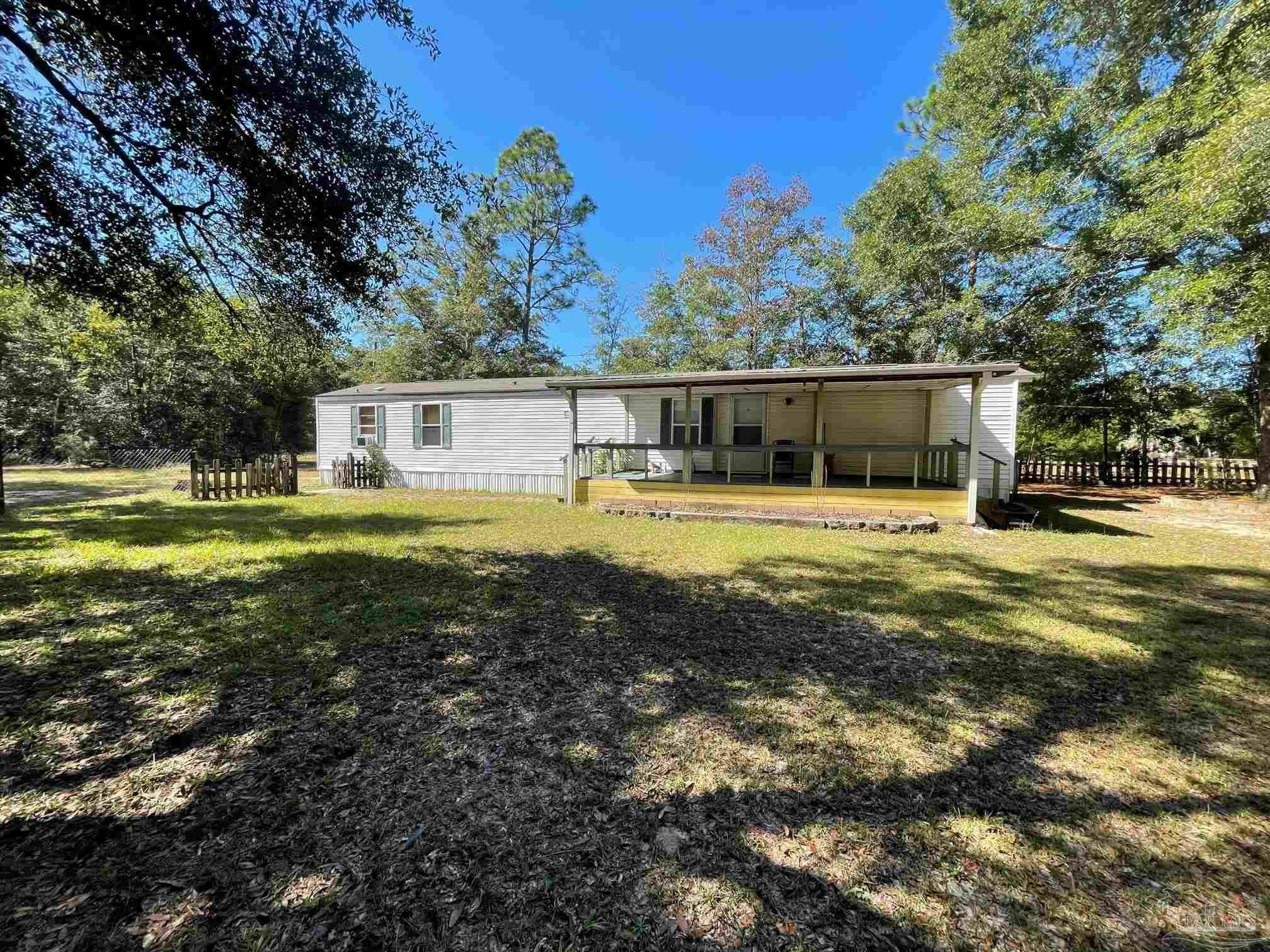 Property Photo:  6761 Nichols Dr  FL 32570 