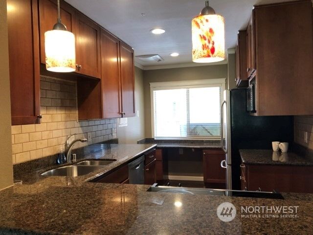 Property Photo:  130 105th Avenue SE 217  WA 98004 