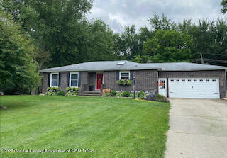 Property Photo:  1162 Wild Cherry Drive  MI 48895 