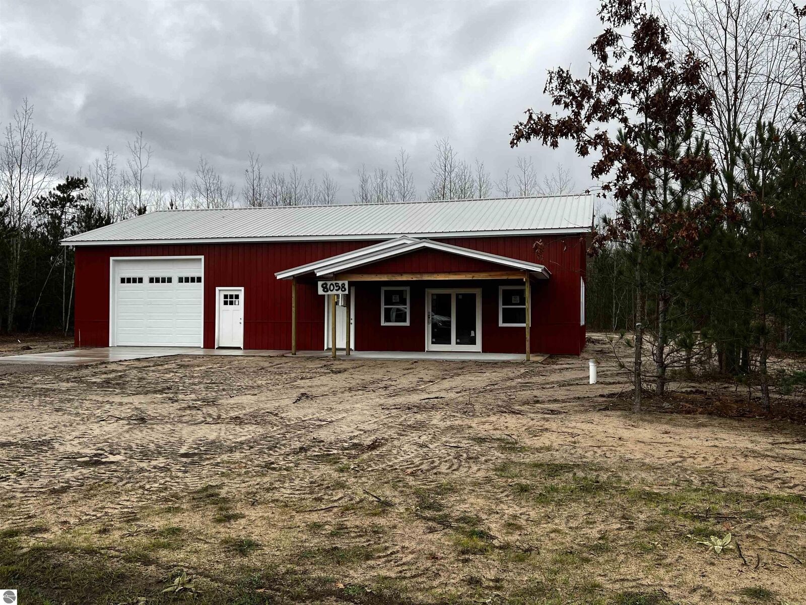 Property Photo:  8058 NW Springwater Drive  MI 49676