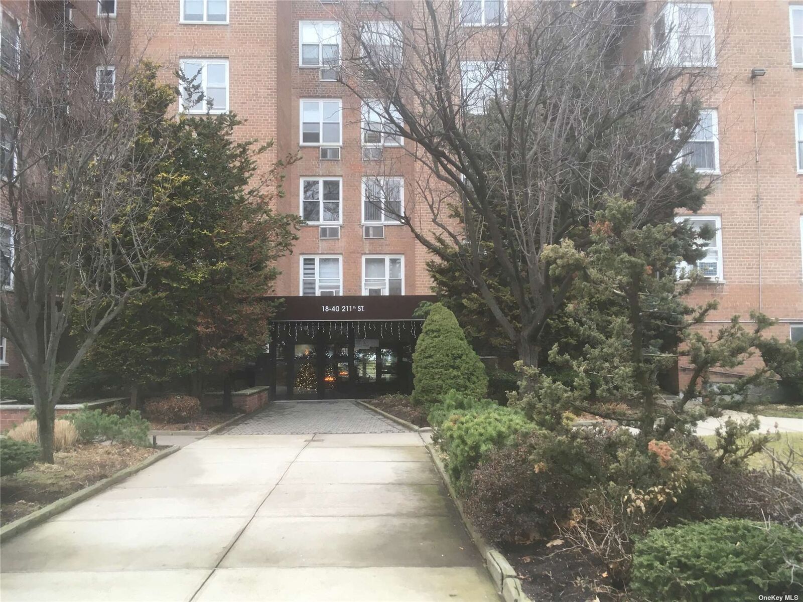 Property Photo:  18-40 211th Street 4H  NY 11360 