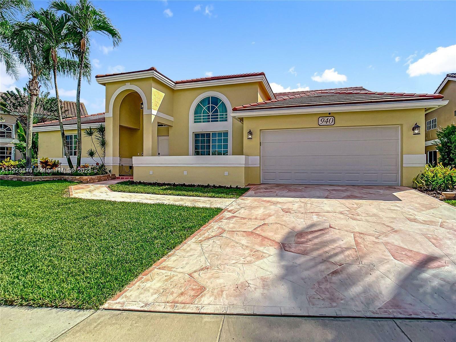 Property Photo:  940 NW 201st Ave  FL 33029 