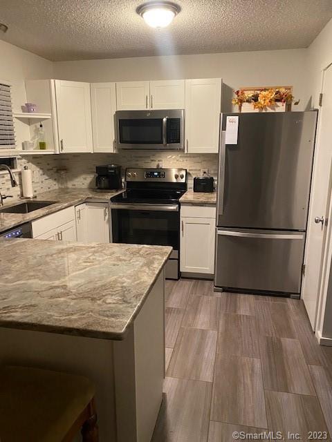 Property Photo:  75 Heritage Village B  CT 06488 