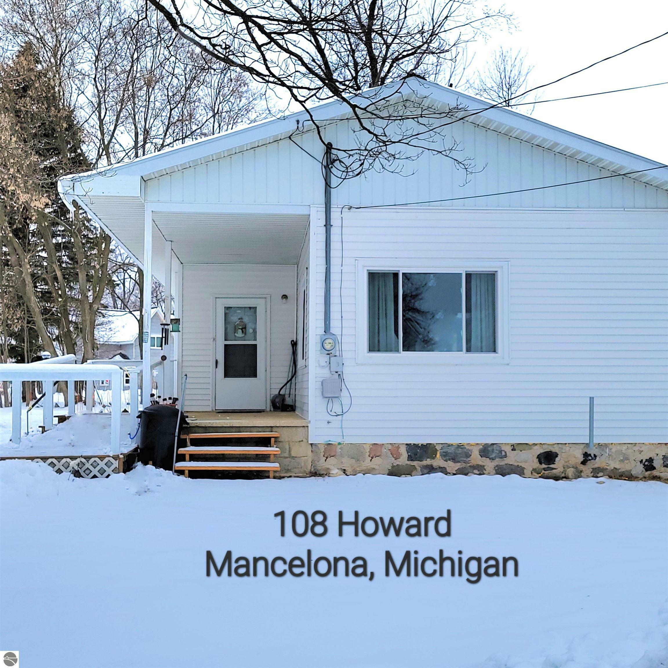 Property Photo:  108 Howard  MI 49659 