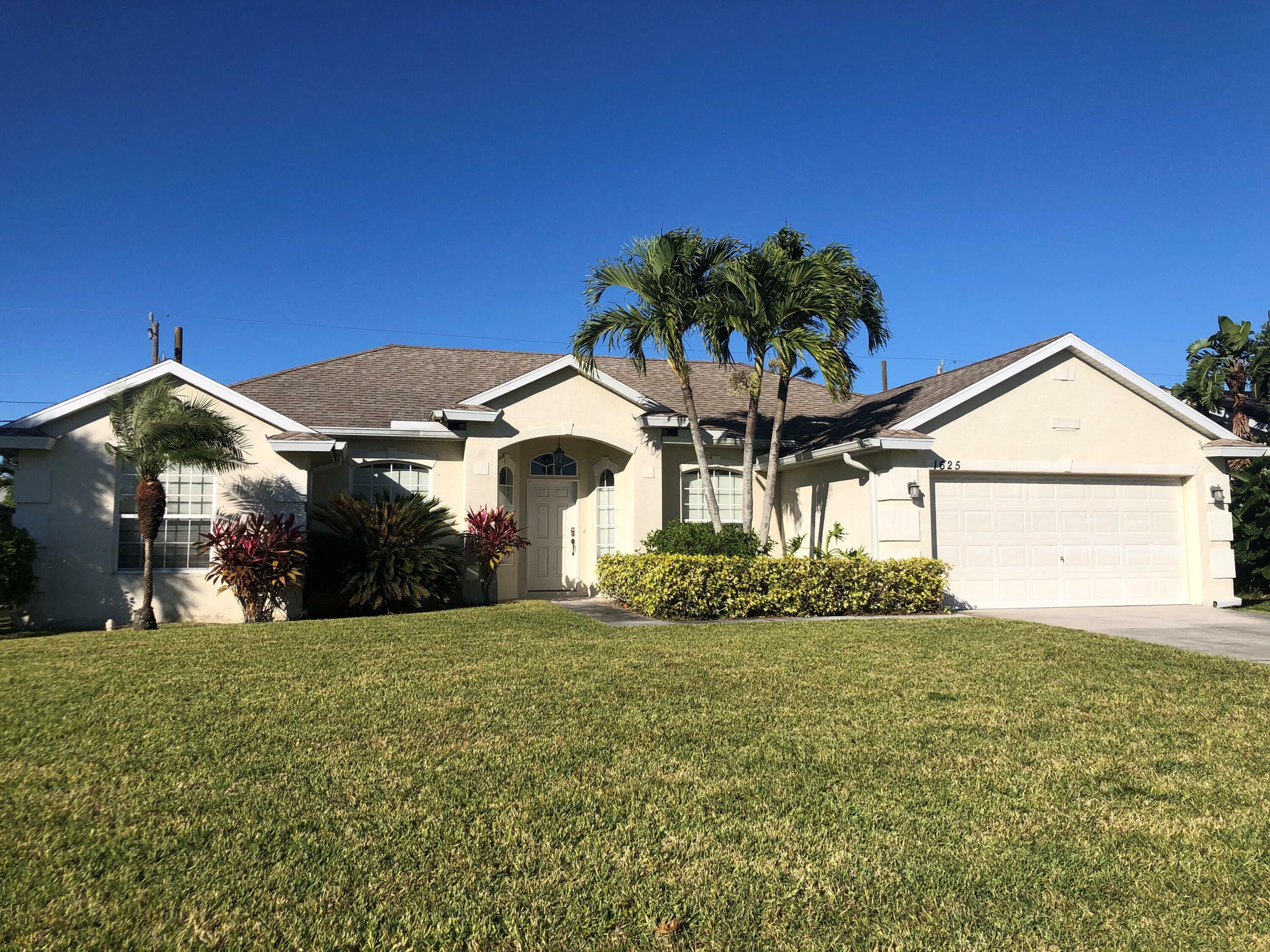 Property Photo:  1625 SW Merchant Lane  FL 34953 