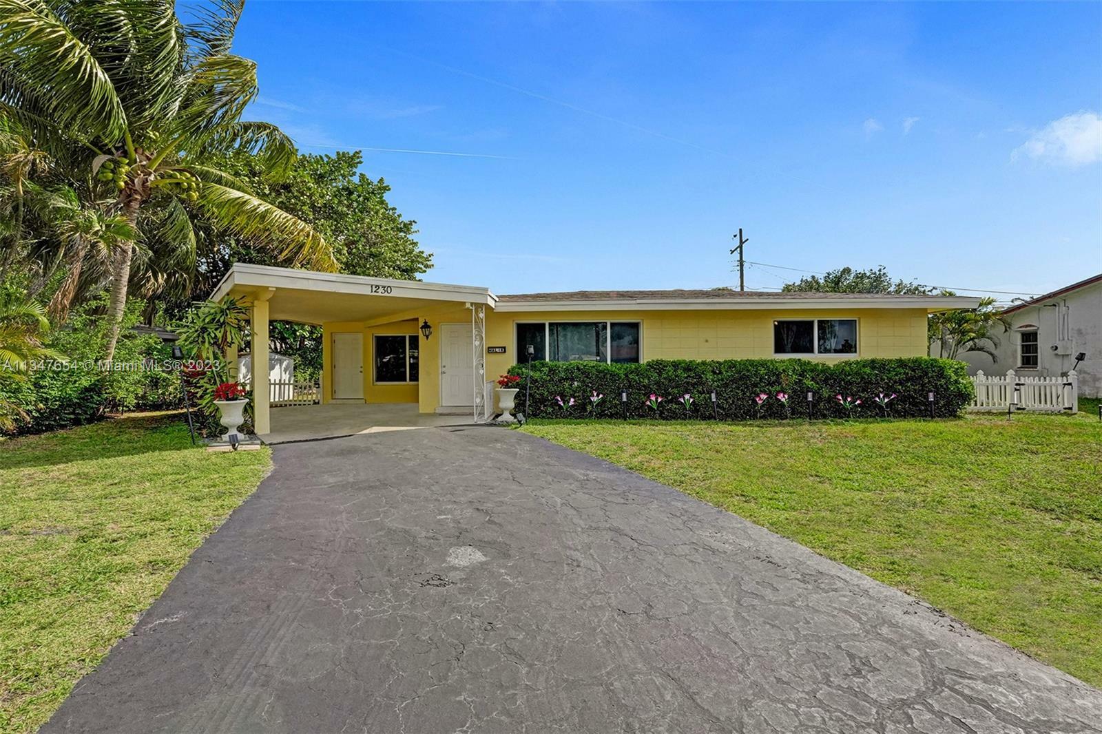 Property Photo:  1230 S Cypress Rd  FL 33060 