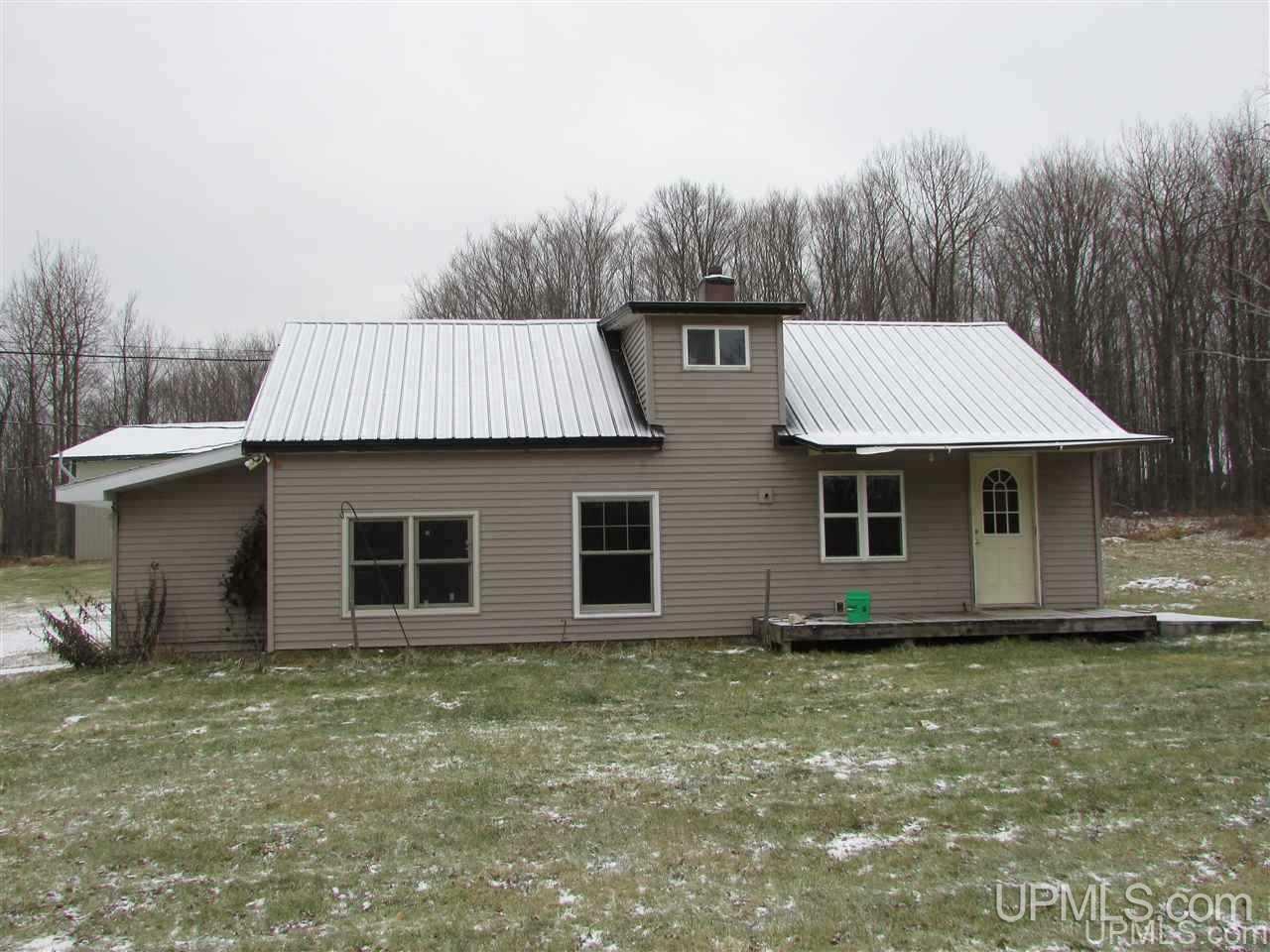 Property Photo:  16048 Usimaki Rd  MI 49946 