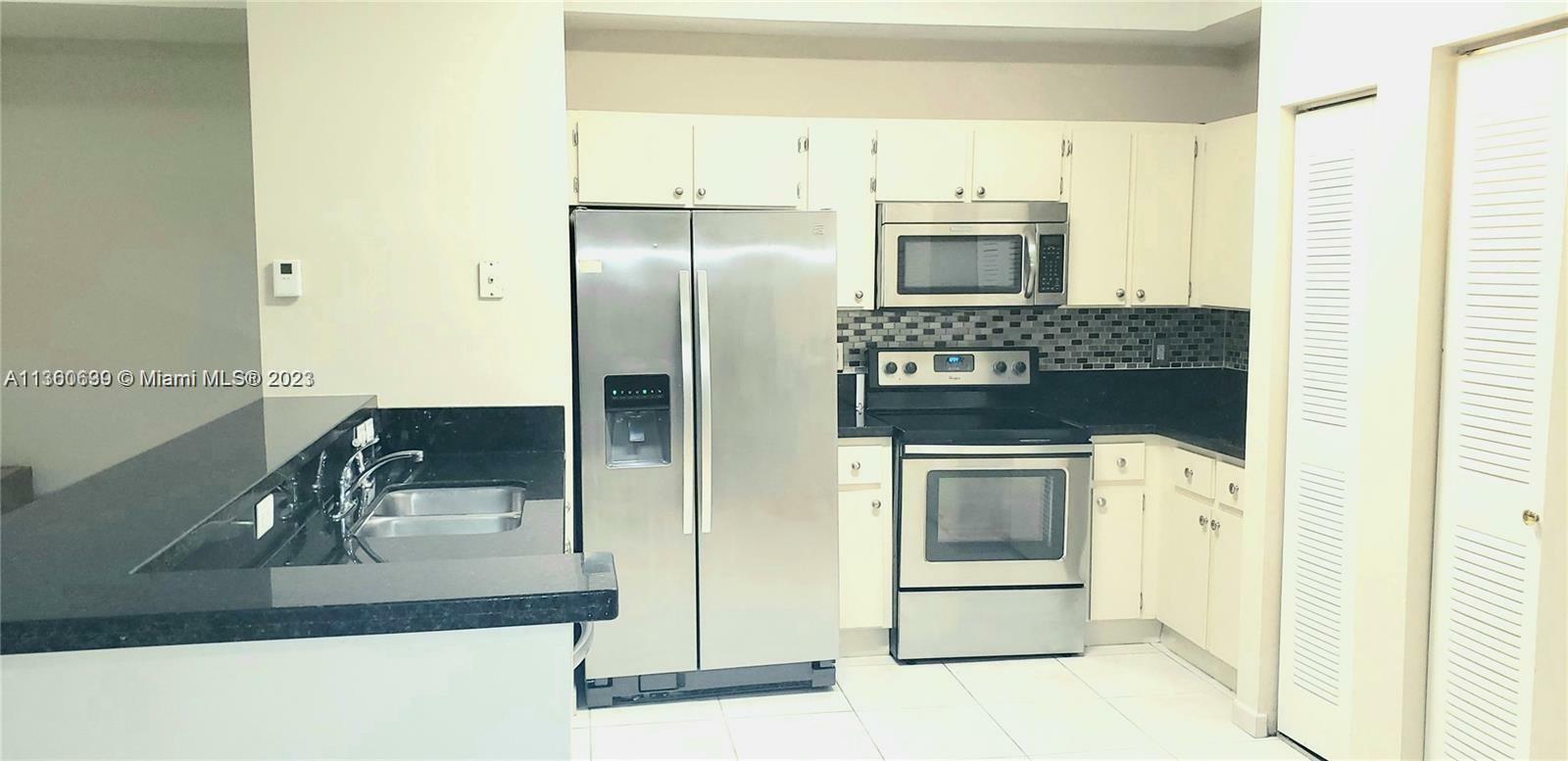 Property Photo:  7230 NW 114th Ave 202  FL 33178 