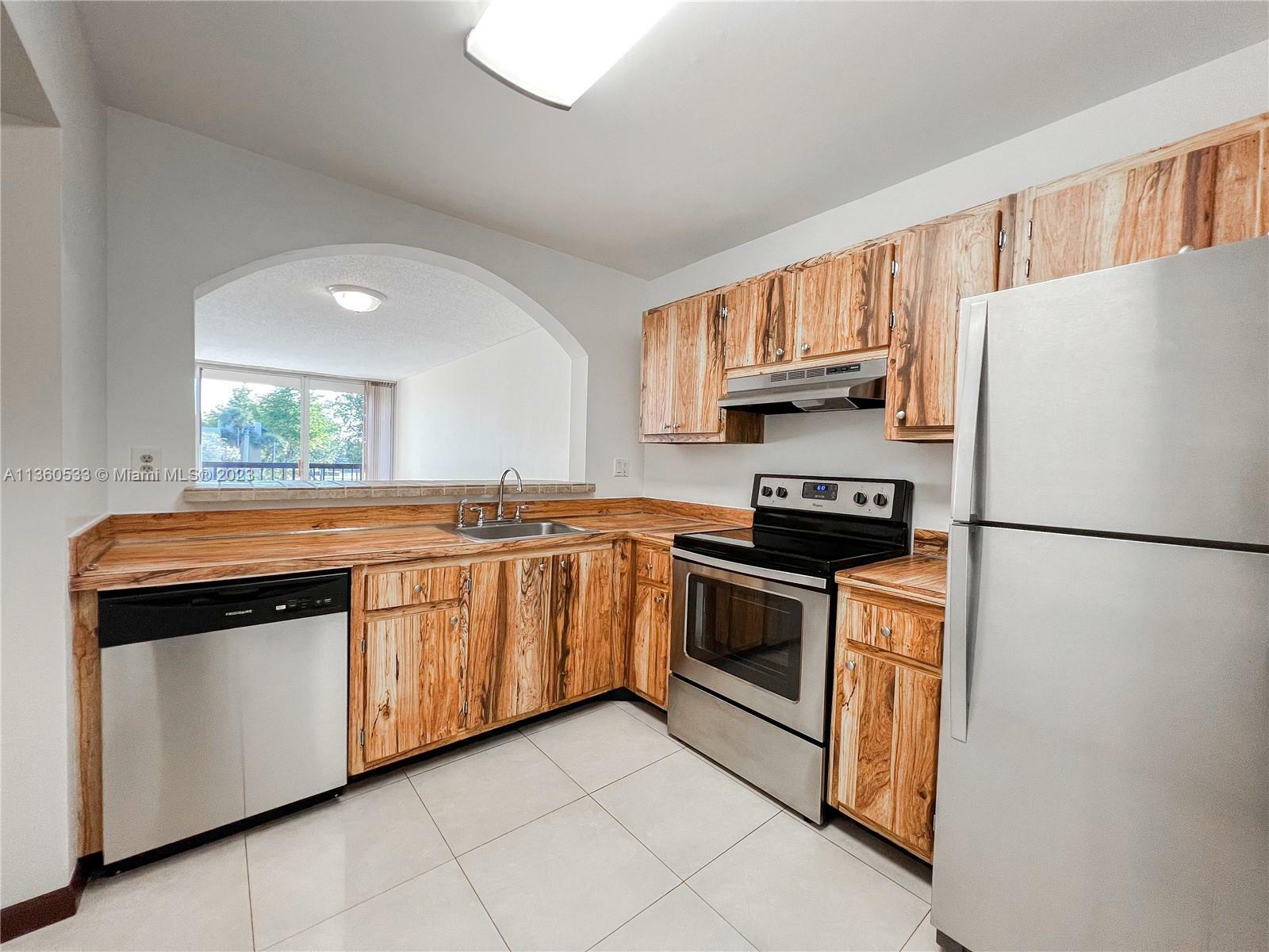 Property Photo:  10845 SW 112th Ave 317  FL 33176 