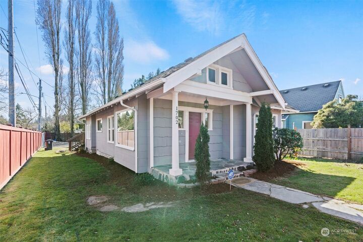Property Photo:  1702 S 58th Street  WA 98408 