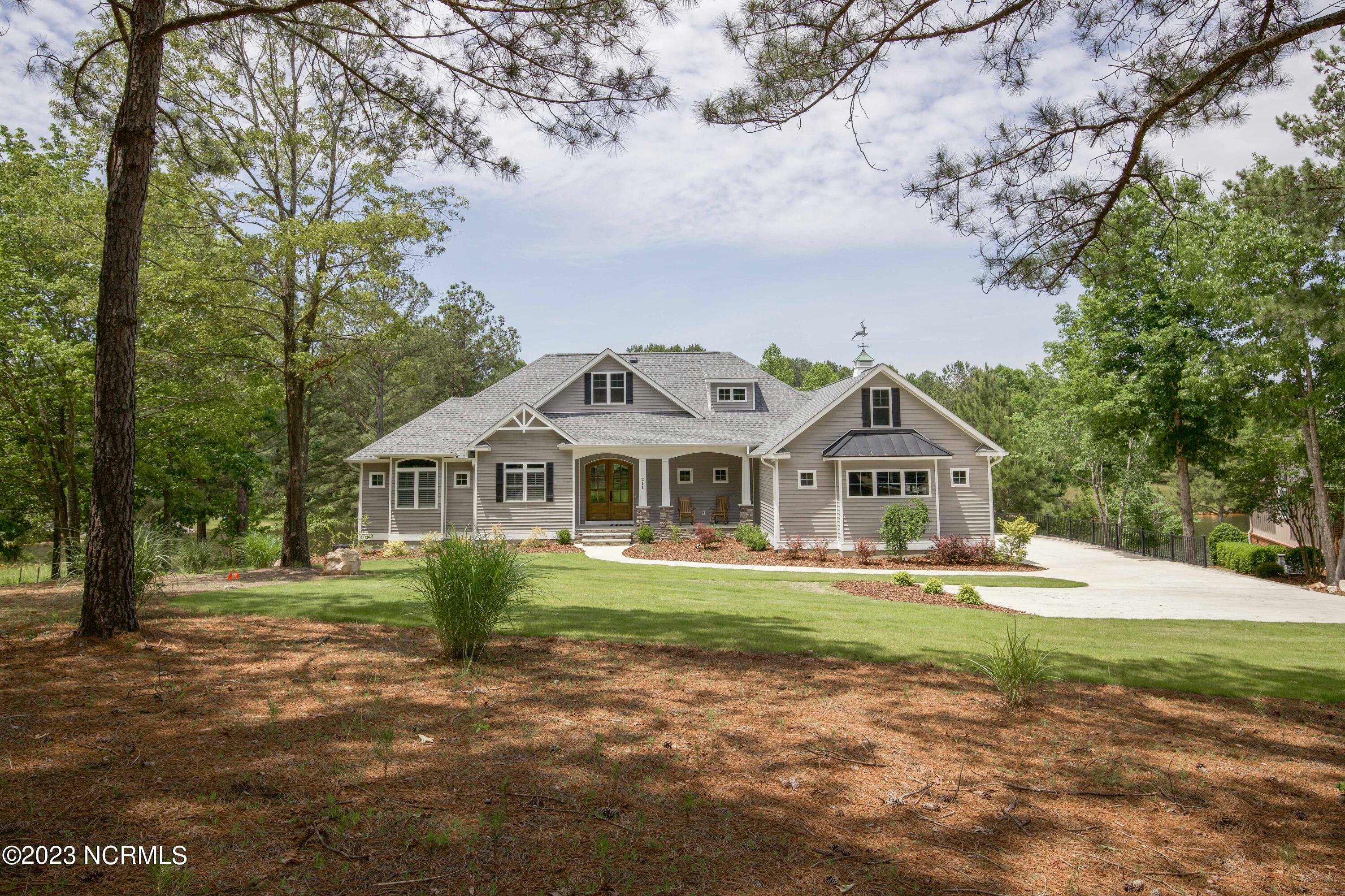 Property Photo:  211 Beths Point  NC 27376 