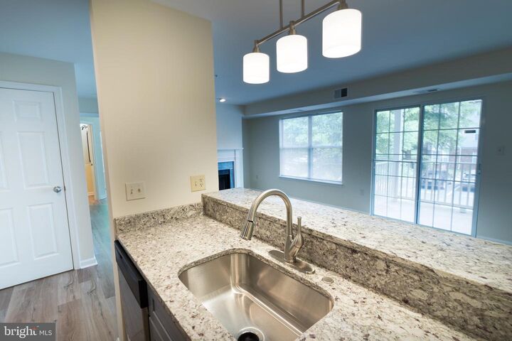 Property Photo: 9804 Lake Pointe Court 202 MD 20774
