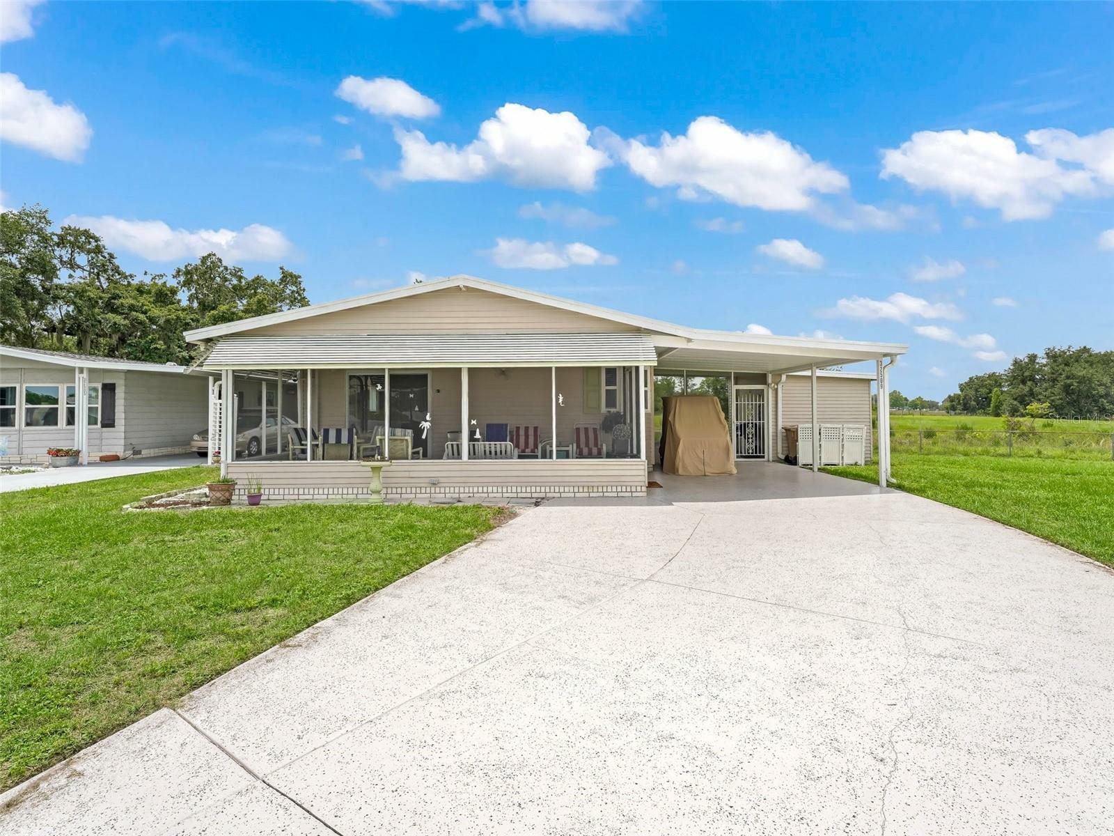 Property Photo:  32509 W Golf Court  FL 34748 