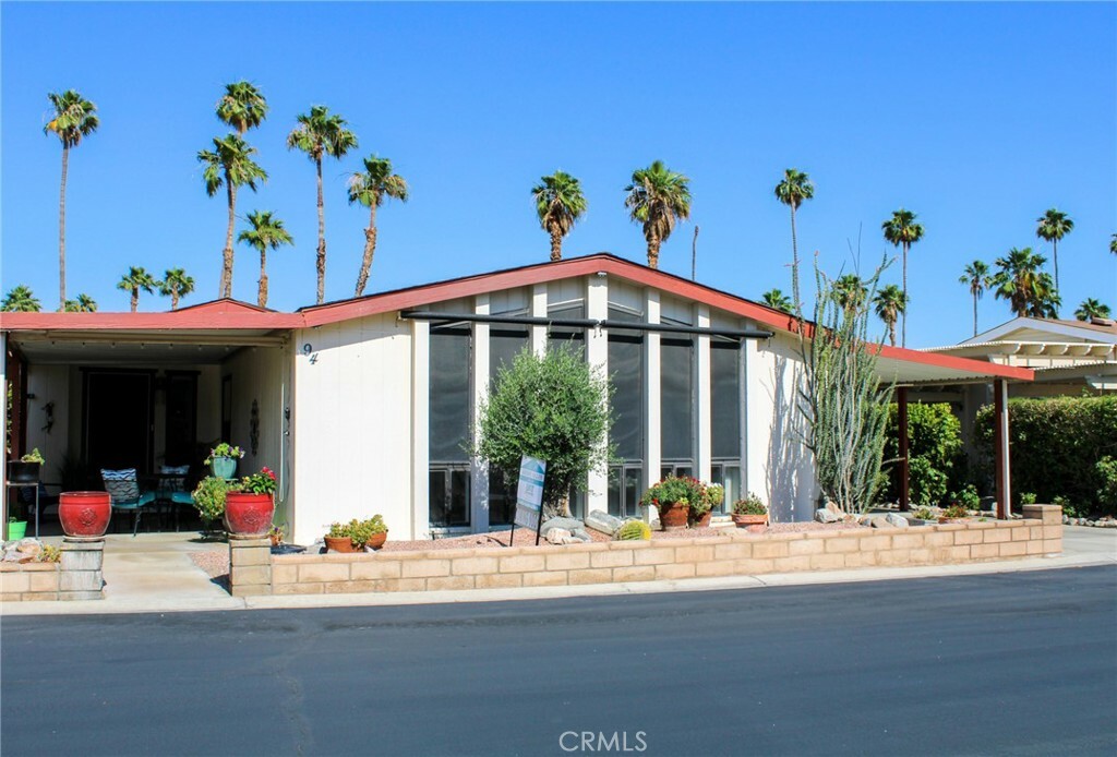 Property Photo:  73450 Country Club Drive 94  CA 92260 