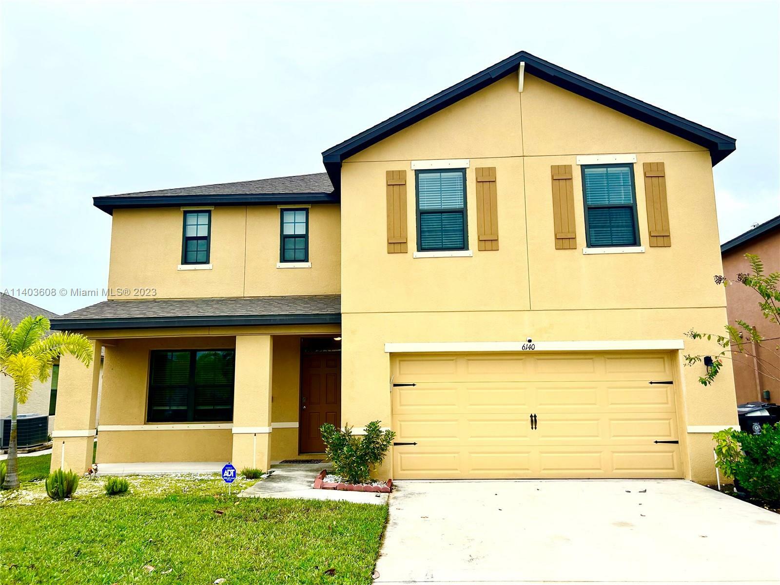 Property Photo: 6140 NW Regent St FL 34983