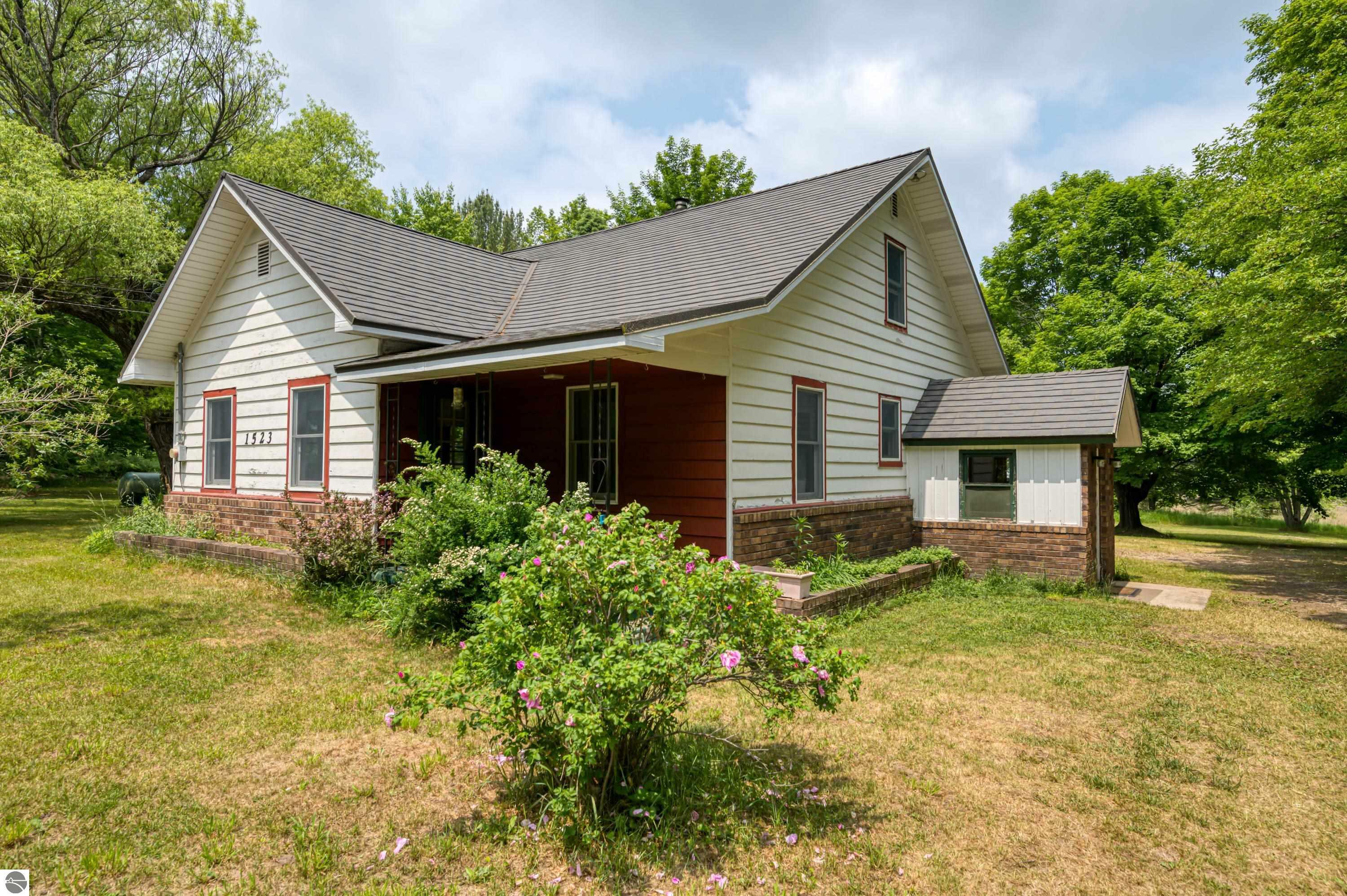 Property Photo:  1523 SE Hatley Road  MI 49633 