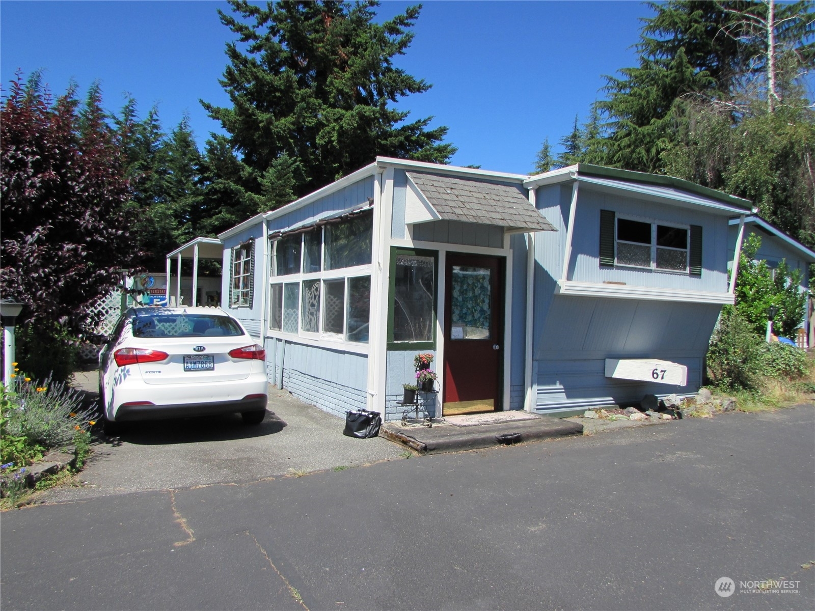 Property Photo:  24222  54th Avenue W 67  WA 98043 