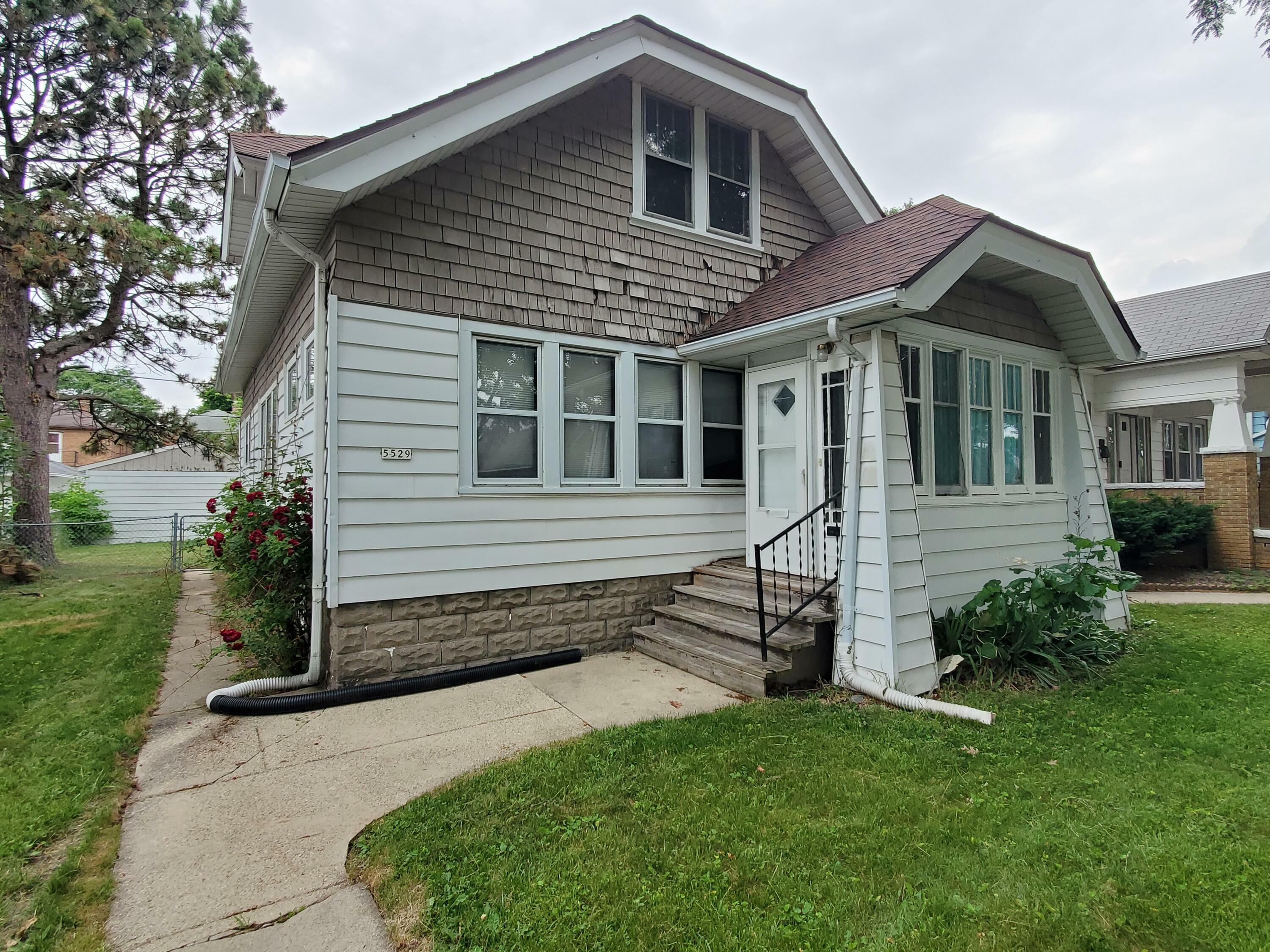 Property Photo:  5529 N 32nd St  WI 53209 