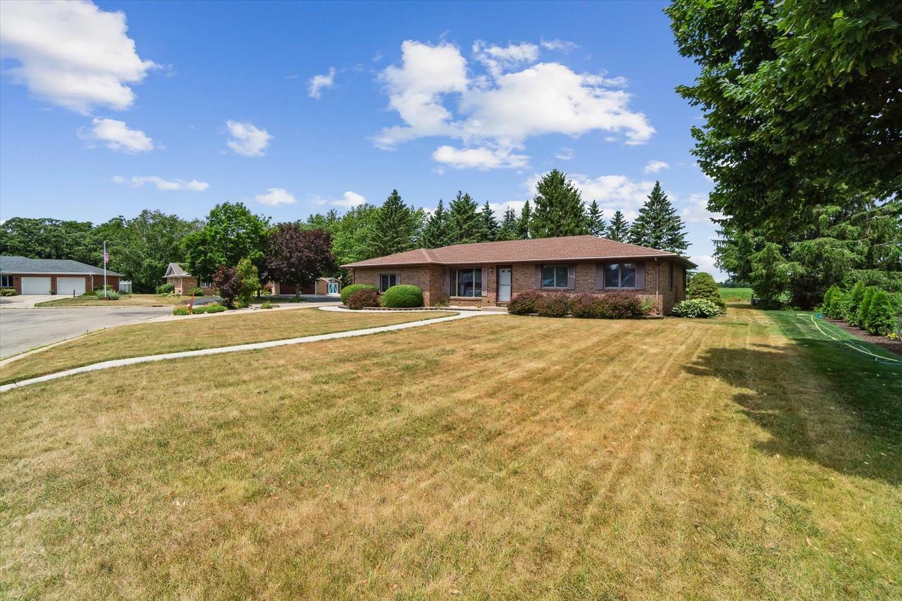 Property Photo:  1250 Surrey Drive  WI 53563 