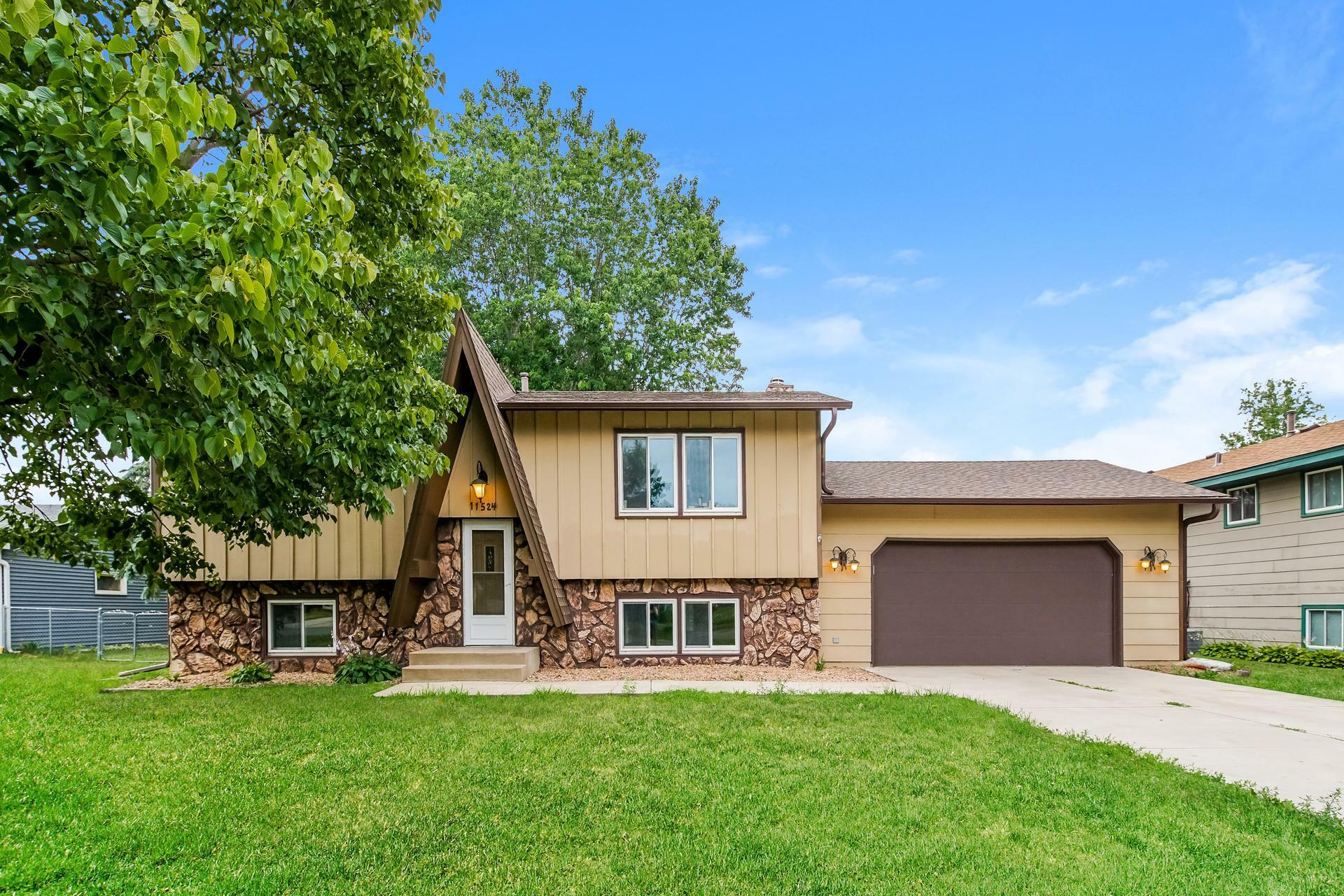 Property Photo:  11524 Monroe Street NE  MN 55434 