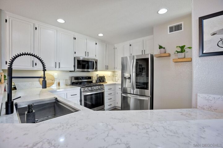 Property Photo:  1259 Natoma Way A  CA 92057 