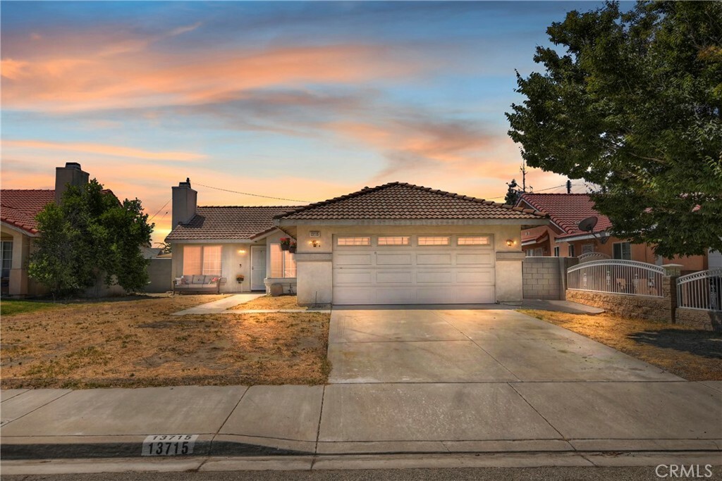 Property Photo:  13715 Seville Avenue  CA 92335 