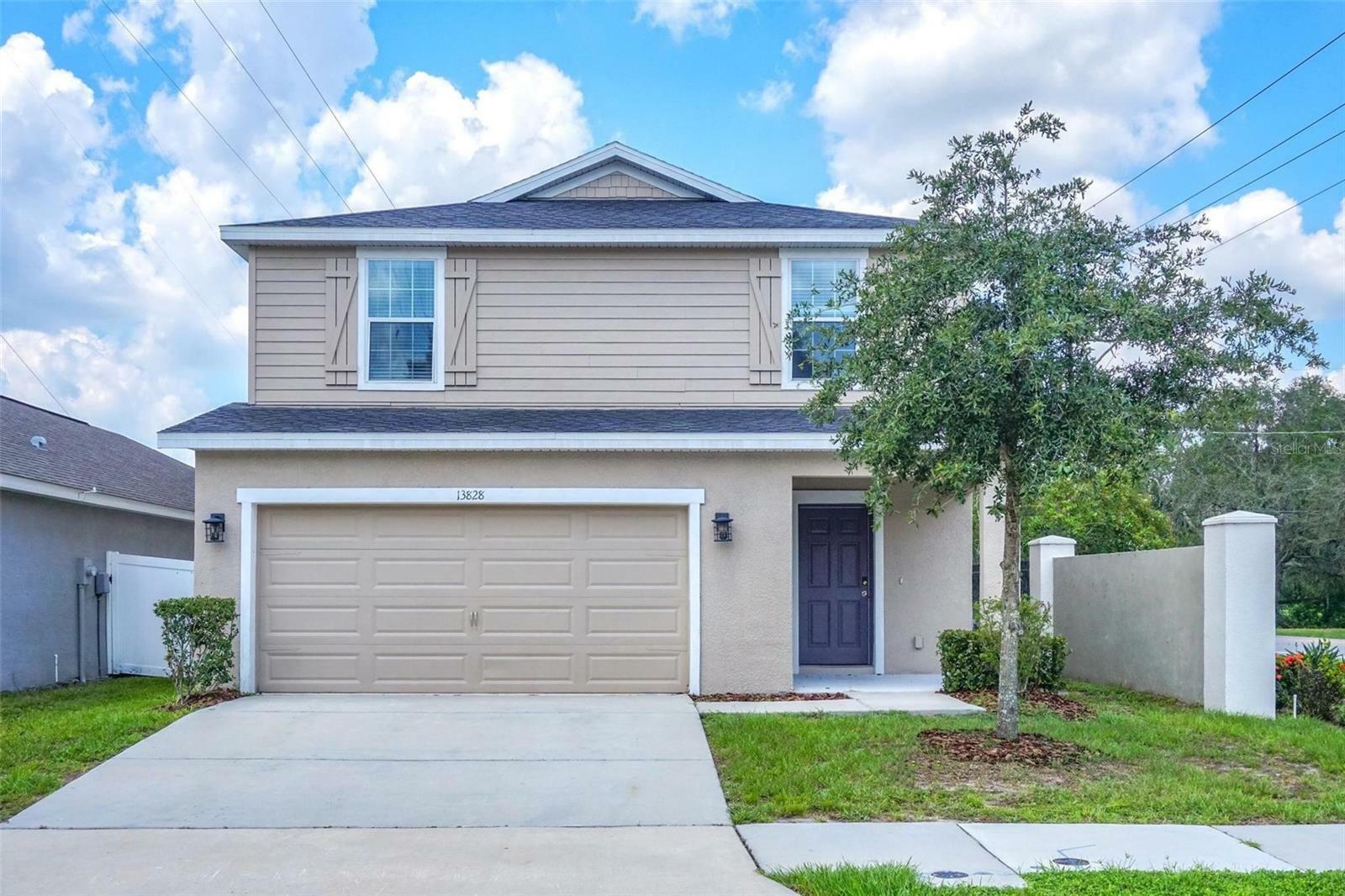 Property Photo:  13828 Harvestwood Lane  FL 33569 