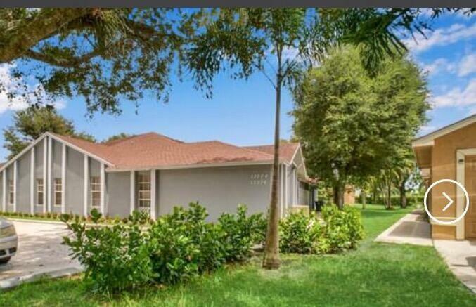 Property Photo: 13912 Folkestone Circle FL 33414