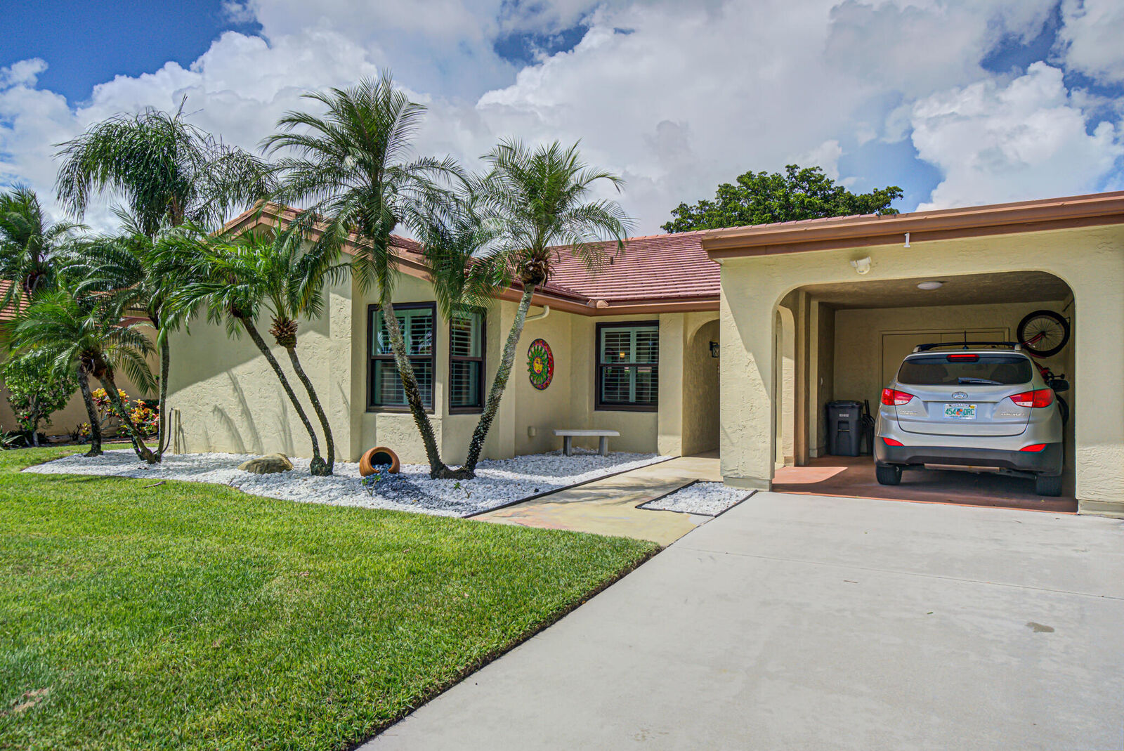 Property Photo: 5895 Forest Grove Drive 1 FL 33437