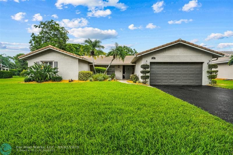 Photo de la propriété: 699 NW 100th Way FL 33071