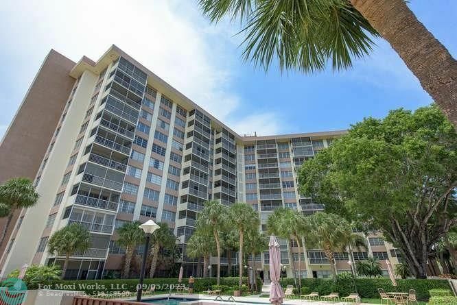Property Photo: 10777 W Sample Rd 212 FL 33065