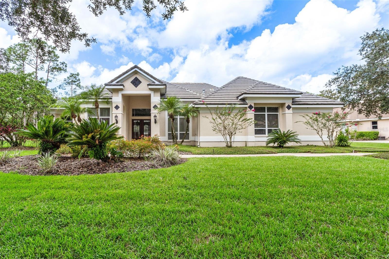 Property Photo: 8902 Magnolia Chase Circle FL 33647
