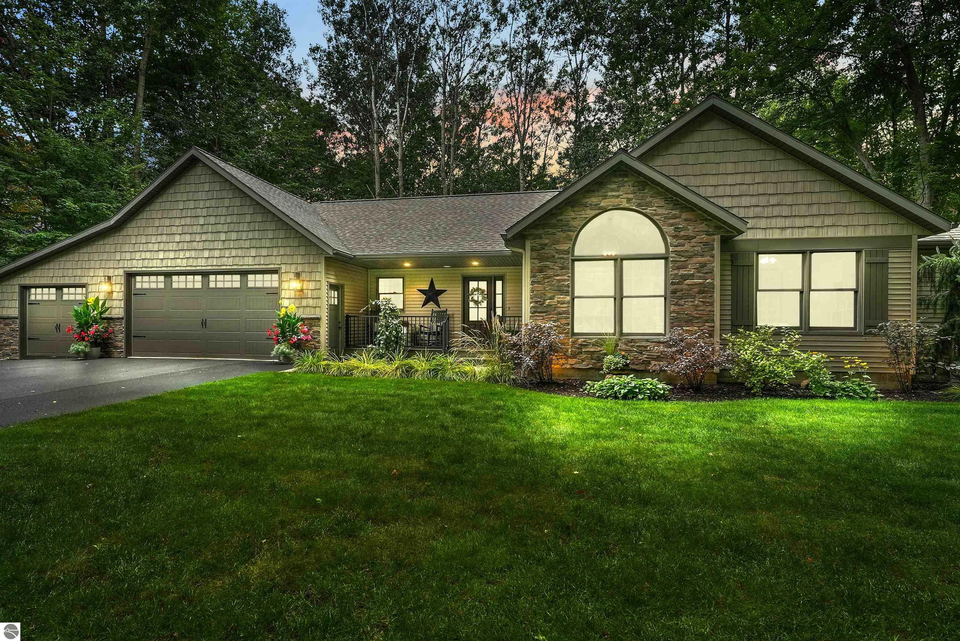 Property Photo:  4880 River Woods Road  MI 49651 