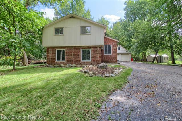 Property Photo:  5811 Pontiac Trail  MI 48323 