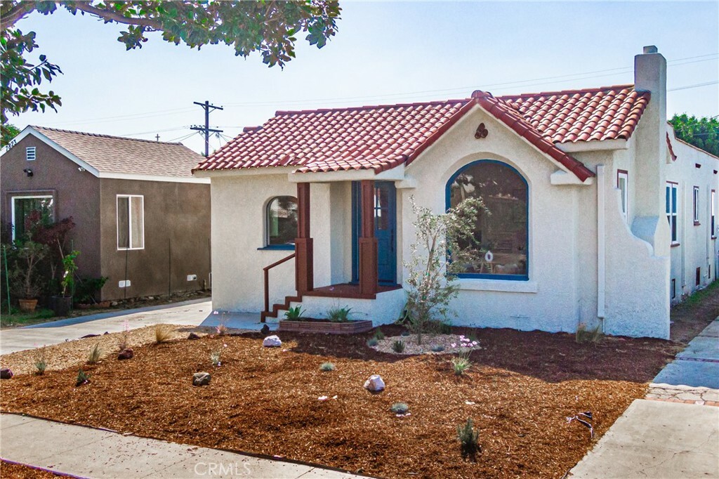 Property Photo:  7819 S Harvard Boulevard  CA 90047 