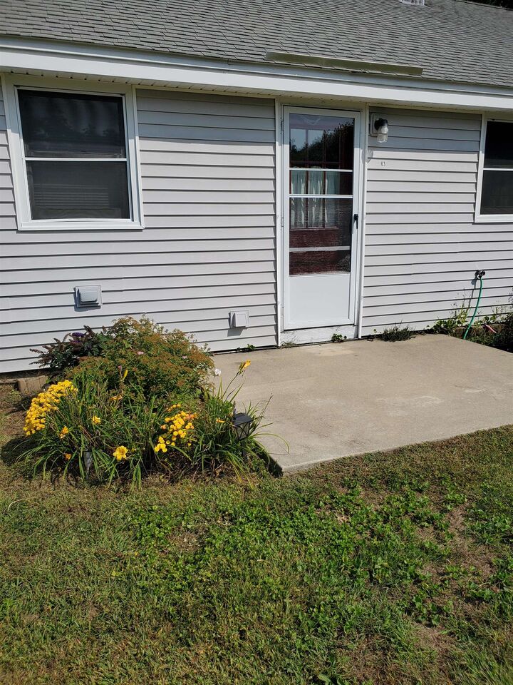 Property Photo:  63 Woodland Hills  ME 03908 