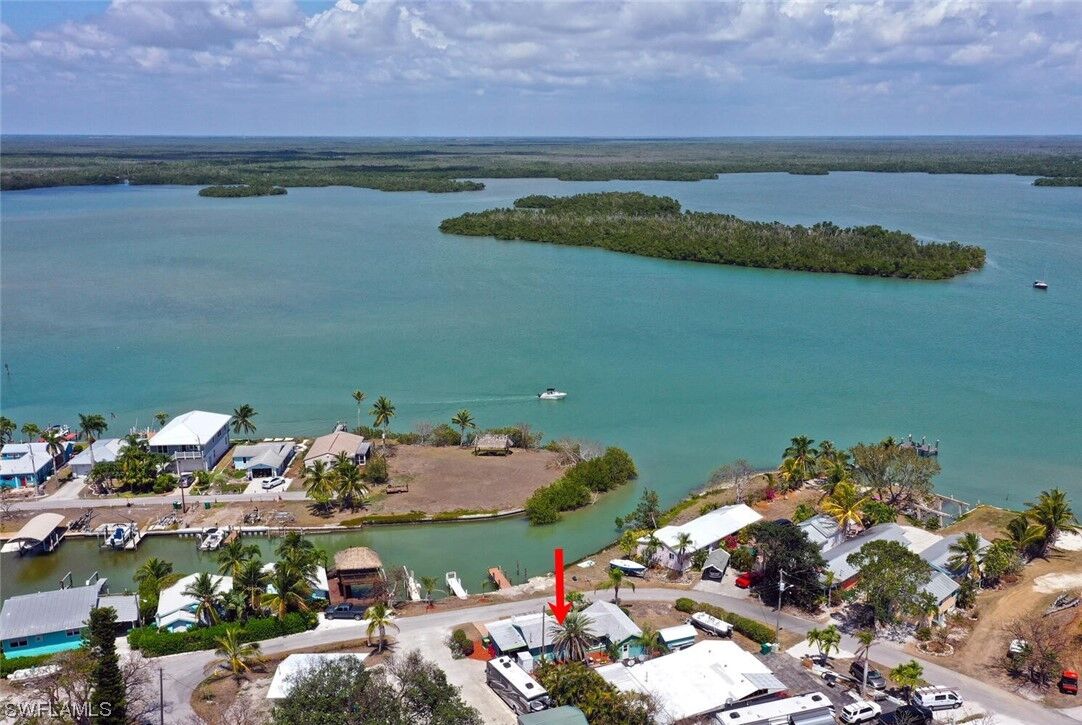 Property Photo: 203 Goodland Drive E FL 34140