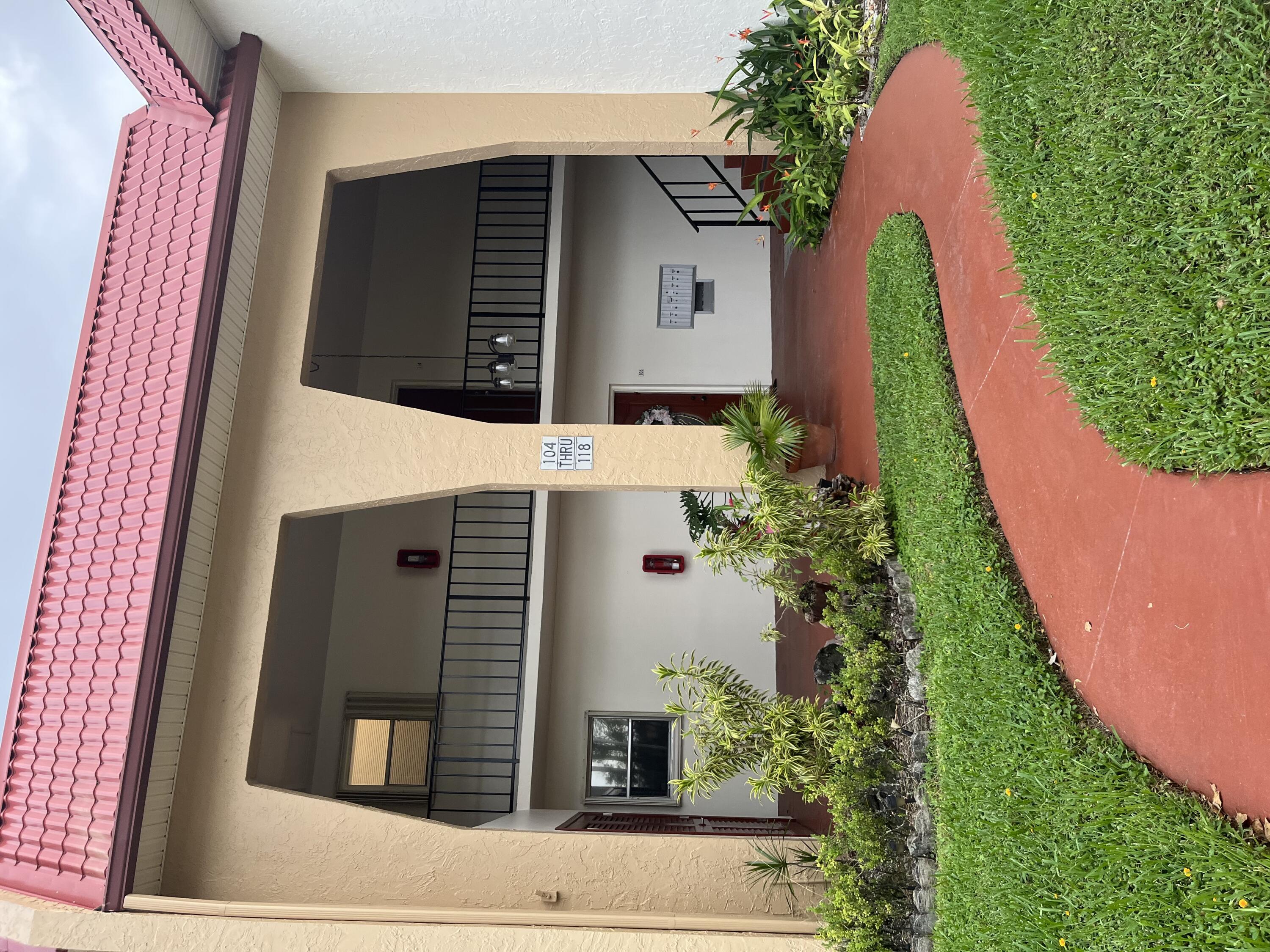 Property Photo: 110 Lake Anne Drive 110 FL 33411