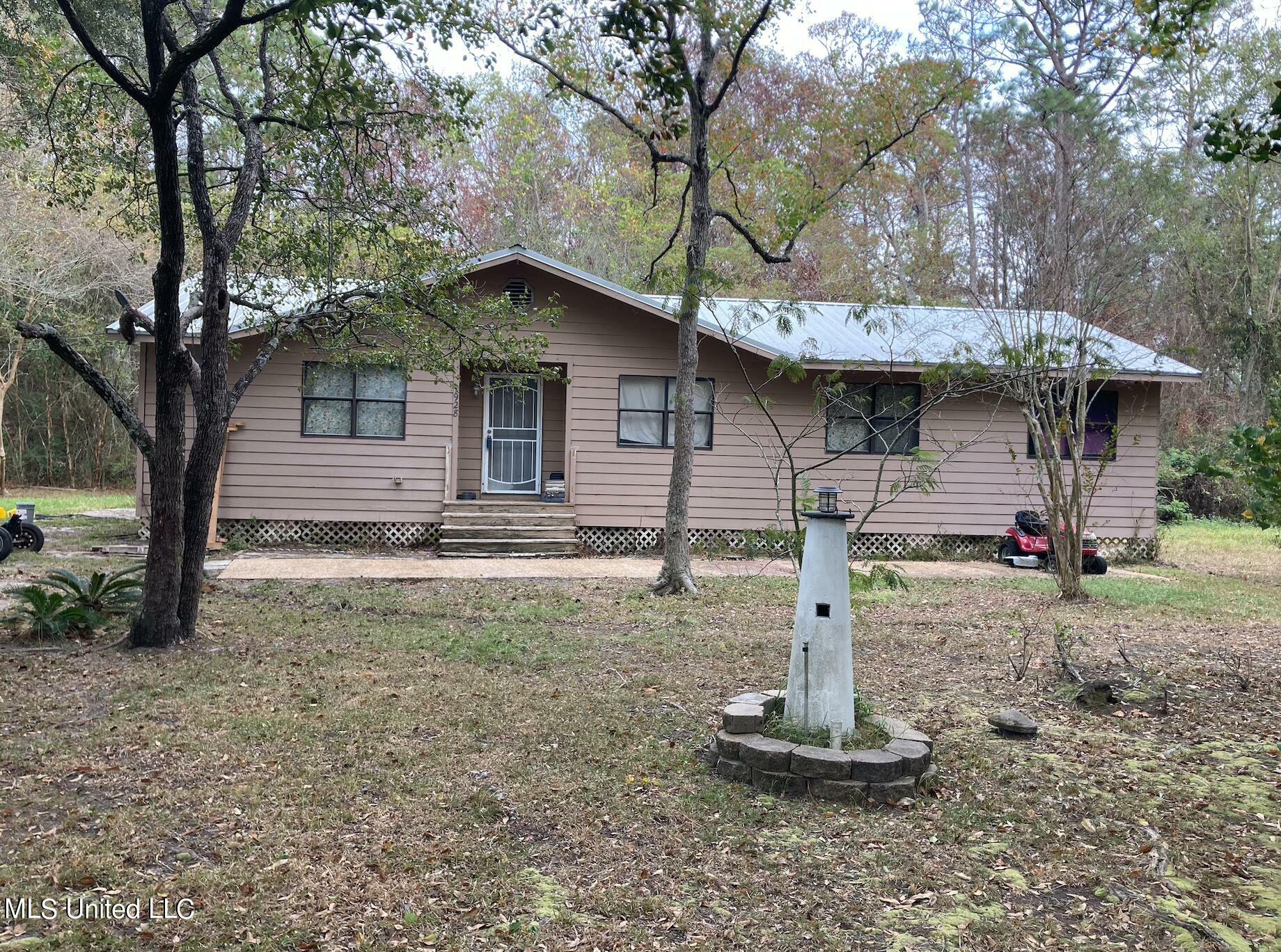 Property Photo:  9928 Theriot Avenue  MS 39565 