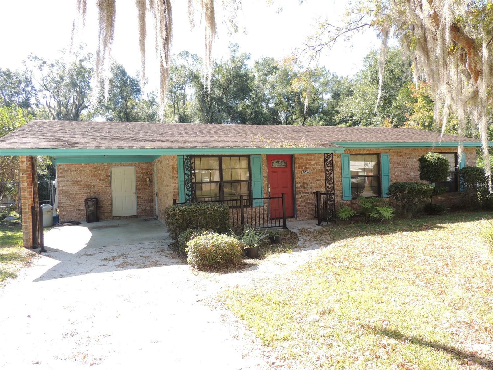 Property Photo:  3239 NW 44th Place  FL 32605 