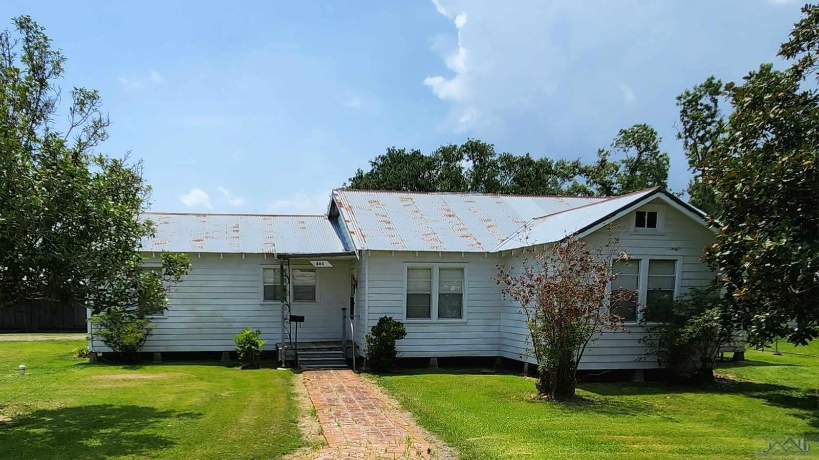 Property Photo:  803 Tenth St  LA 70538 