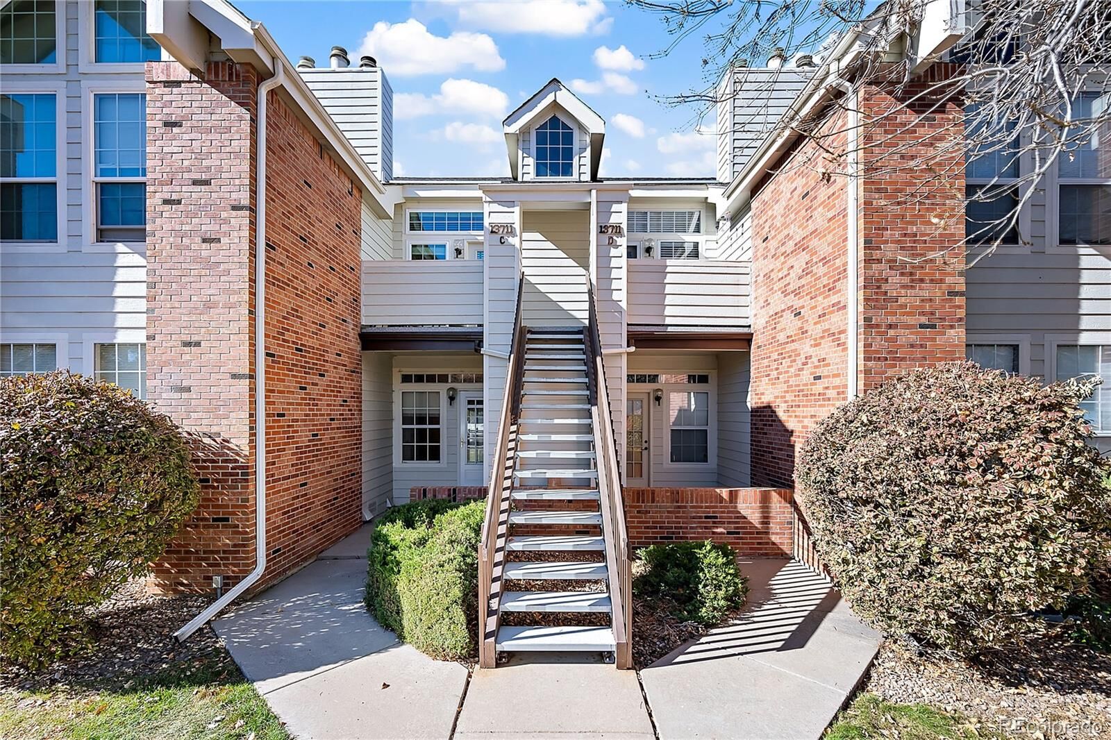 Property Photo:  13711 E Lehigh Avenue C  CO 80014 