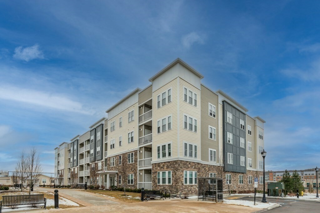 Property Photo: 120 University Ave 2106 MA 02090